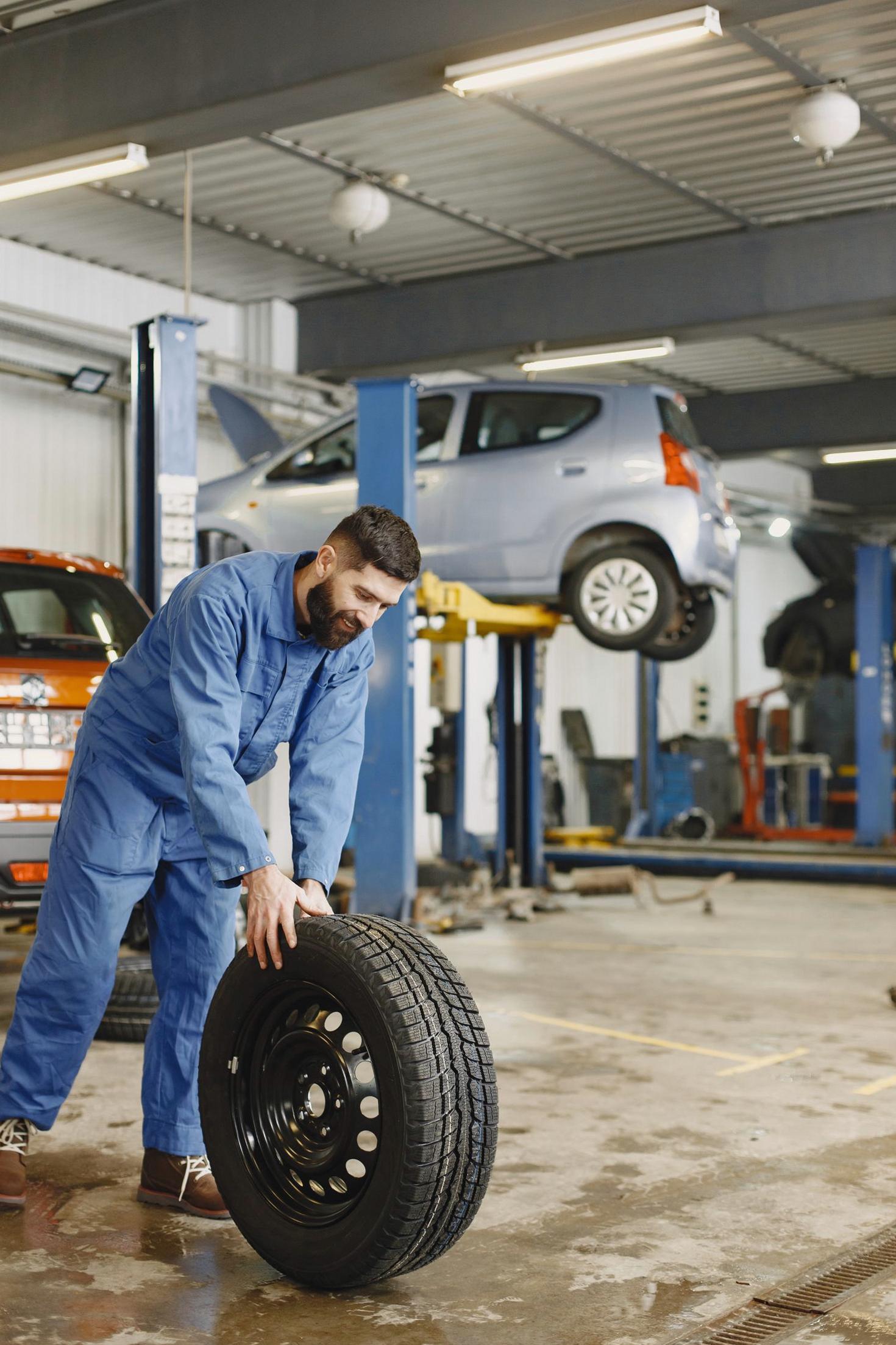 Mechanic balancing a tire